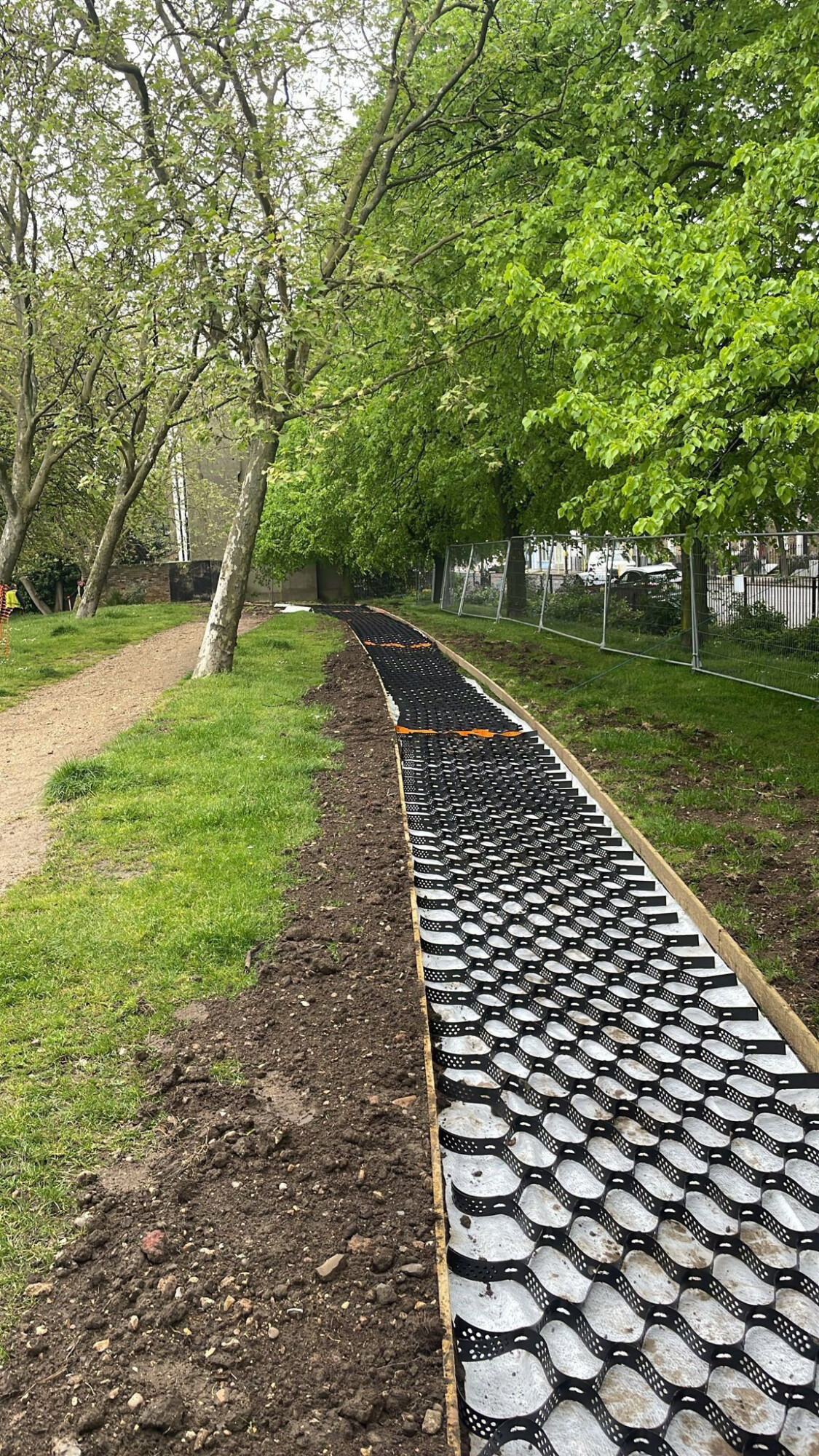 CORE TRP cells follow a tree-lined path during installation at Barnard Park.