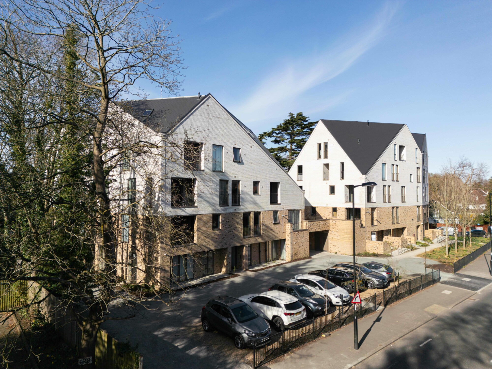 New homes, retained trees and parking at Foxley Lane in Purley.